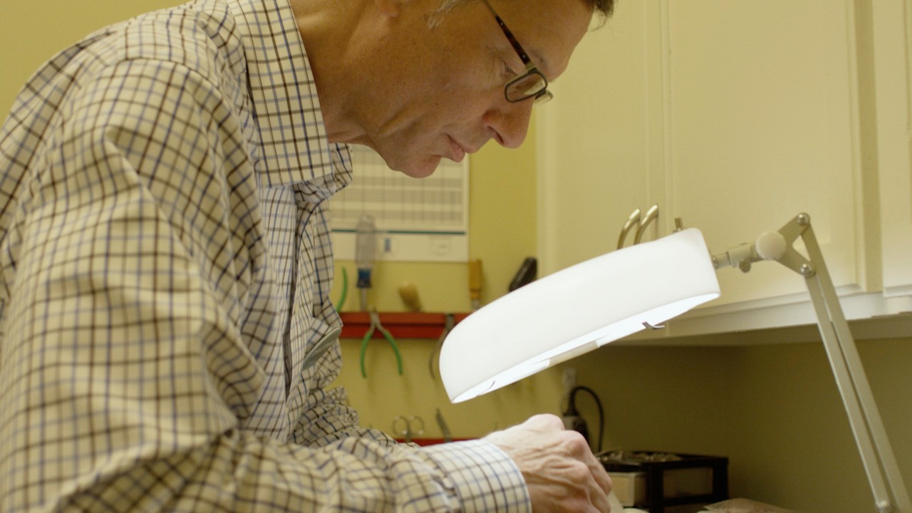 Miracle-Ear hearing aid specialist at work